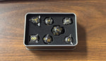 Black 7 Spikey Metal Dice with Gold Numbers