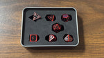 Black Shadow 7 Metal Dice with Red Numbers